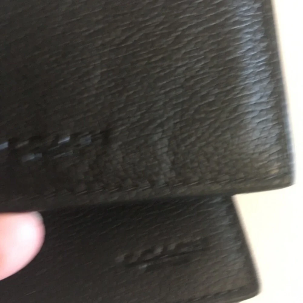 Men’s black leather Coach 3 in 1 wallet NWT. ID card holder slides out